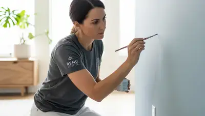 Paint crew repairing wall scuffs and trim touch-ups in Pittsburgh, PA